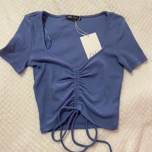 blue drawstring front crop top!
